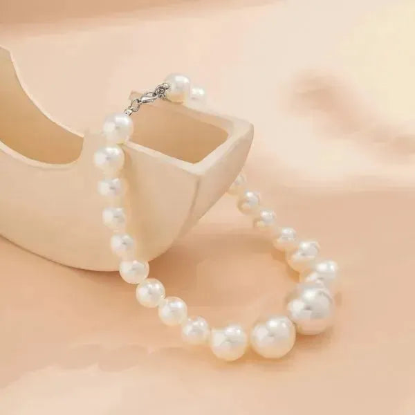 PERLENKETTE DAMEN: HALSKETTE UND ARMBAND - IMITATION GROSSE PERLE AUF KURZE HALSKETTE - Königlicher Siegelring