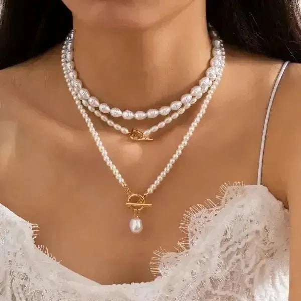 PERLENKETTE DAMEN MODESCHMUCK WEIß UND GOLD - Königlicher Siegelring