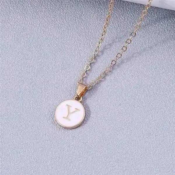 KETTE MIT BUCHSTABEN AUS GOLD BESTEHEND AUS INITIALIEN - Königlicher Siegelring