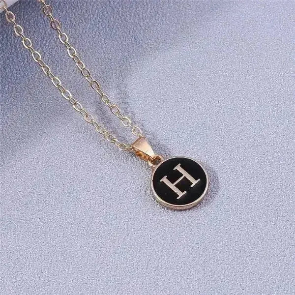 KETTE MIT BUCHSTABEN AUS GOLD BESTEHEND AUS INITIALIEN - Königlicher Siegelring
