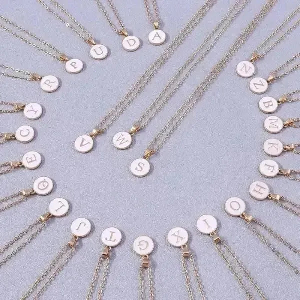 KETTE MIT BUCHSTABEN AUS GOLD BESTEHEND AUS INITIALIEN - Königlicher Siegelring