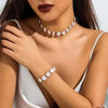 PERLENKETTE DAMEN : ELEGANTE FLACHE NACHAHMUNG, TRENDIGES ARMBAND - Königlicher Siegelring