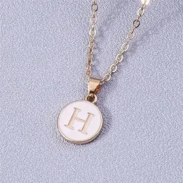 KETTE MIT BUCHSTABEN AUS GOLD BESTEHEND AUS INITIALIEN - Königlicher Siegelring